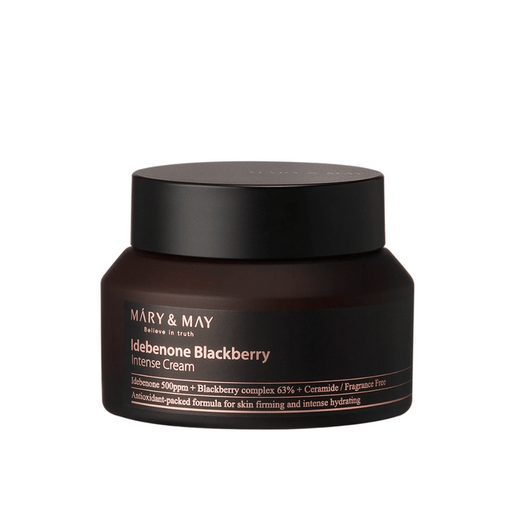 En burk med MARY & MAY Idebenone Blackberry Intense Cream. Denna kräm innehåller 500 ppm idebenon, 63% björnbärskomplex och ceramider, designad för att ge intensiv återfuktning och fasthet till huden. Fragrance-free och antioxidantberikad formula.